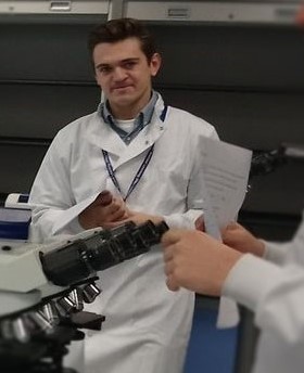 Matt standing in lab 