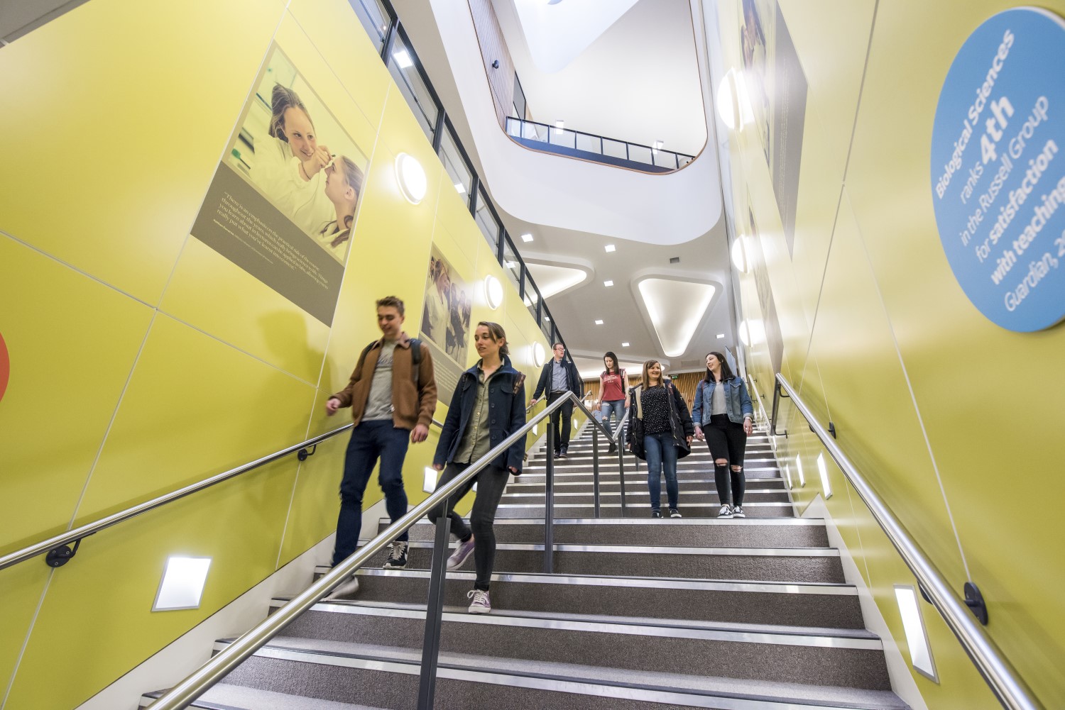 Student walking down stairs